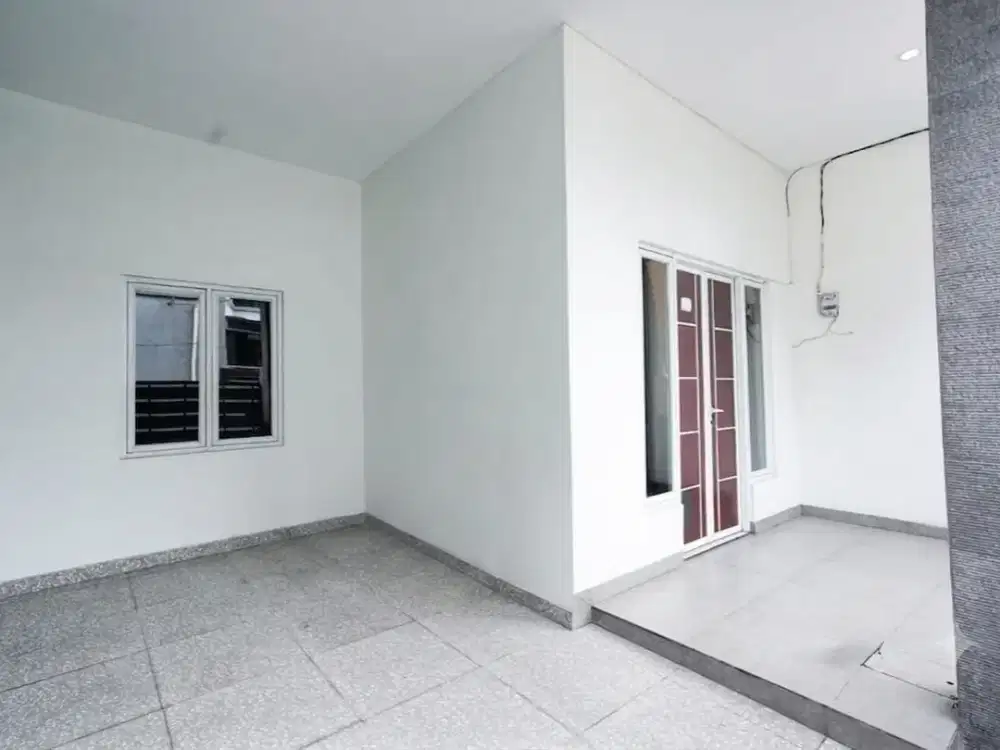 Rumah Bebas Banjir Dengan Rooftop Di Kota Harapan Indah