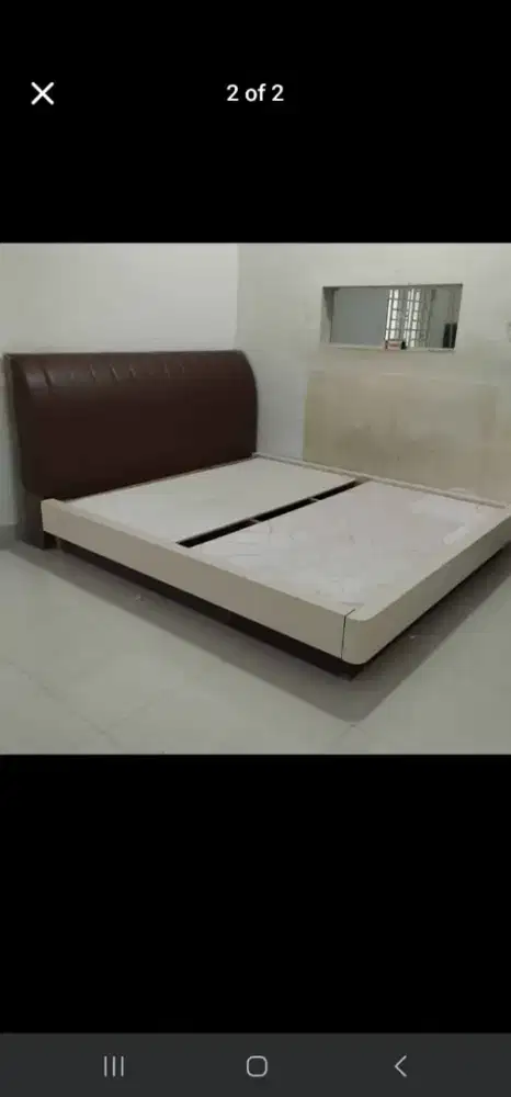 Tempat tidur kayu minimalis