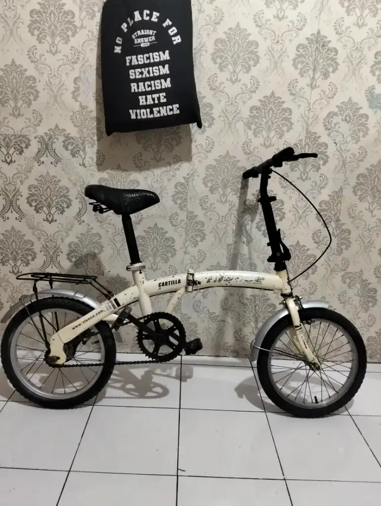 Sepeda lipat ukuran 16 untuk umur 5 sampai 10 tahun