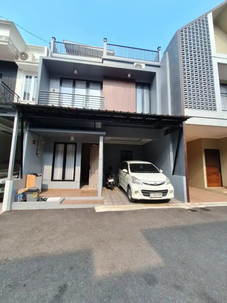 Rumah Asri dengan View Danau