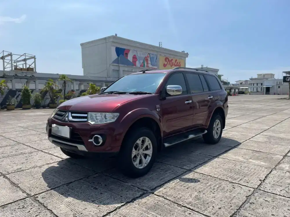 Like new. Pajero Dakar 2014 maron
