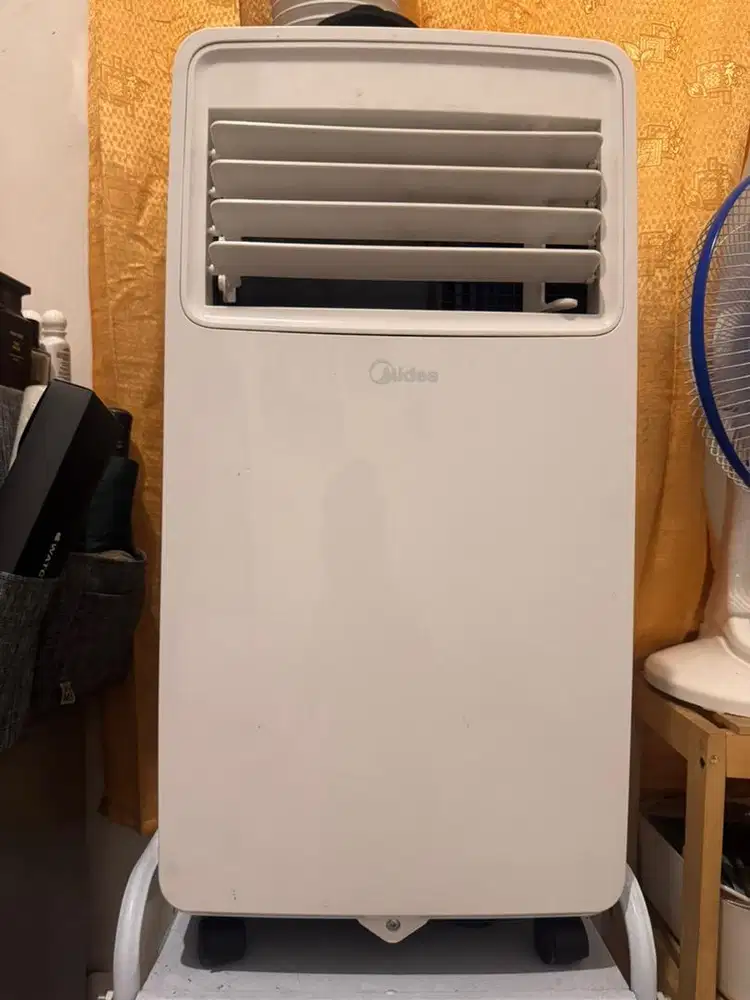 AC Portable Midea 1/2 PK