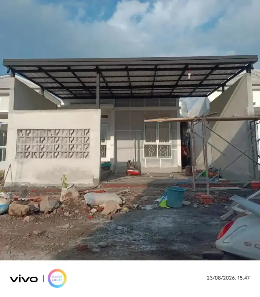 Kanopi baja ringan dan garasi