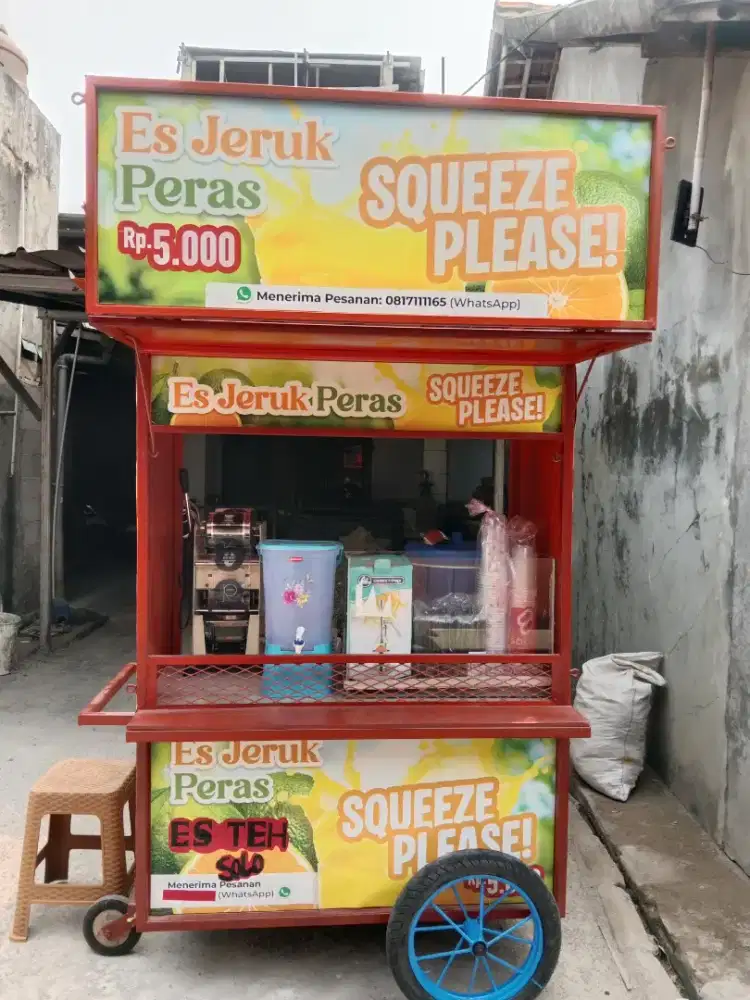 Gerobak teh solo dan jeruk peras