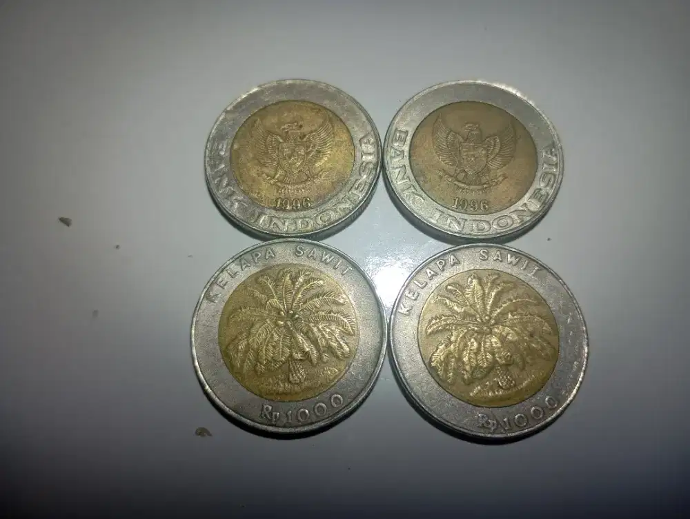 Uang koin seribu rupiah kelapa sawit