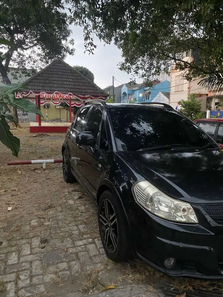 Suzuki SX4 2009 Bensin
