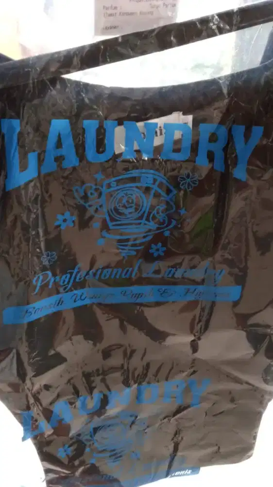Bagian Setrika Uap Laundry