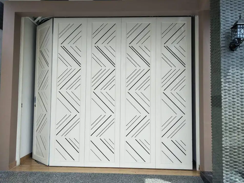 Pintu garasi besi model laser cutting/minimalis
