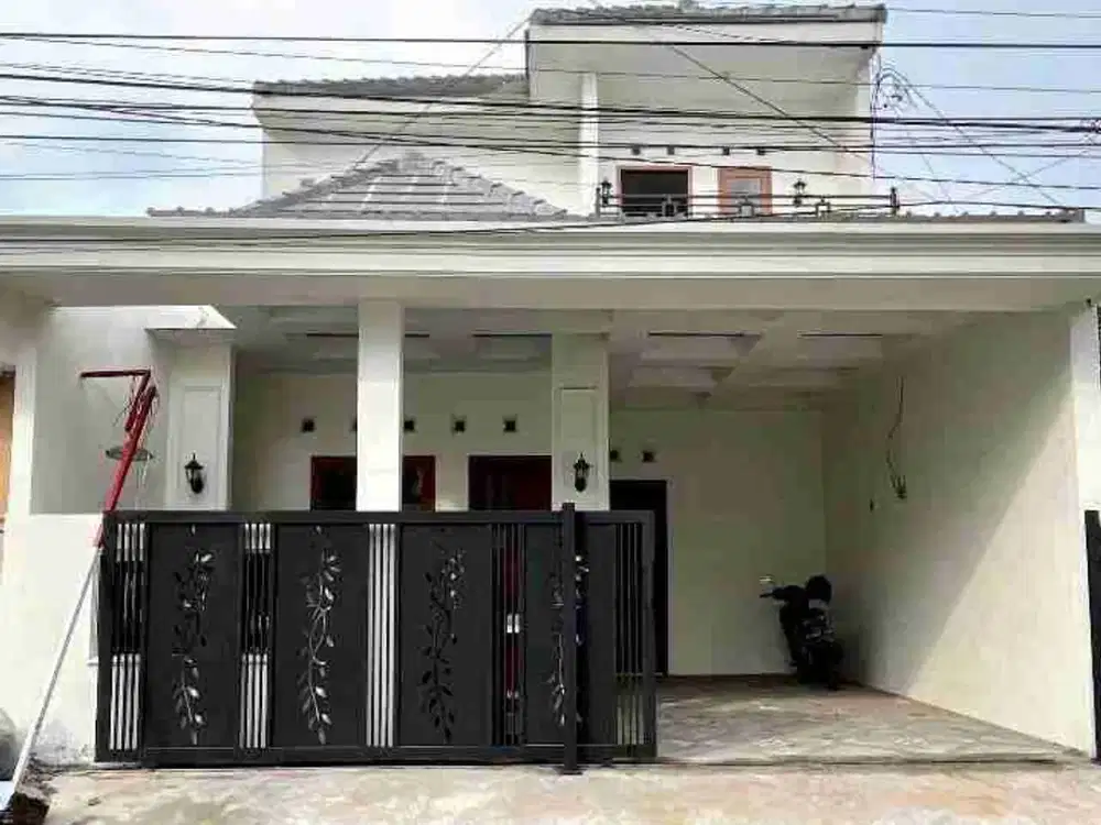 Rumah 1,5 Lantai Desain Minimalis Modern Sawojajar I