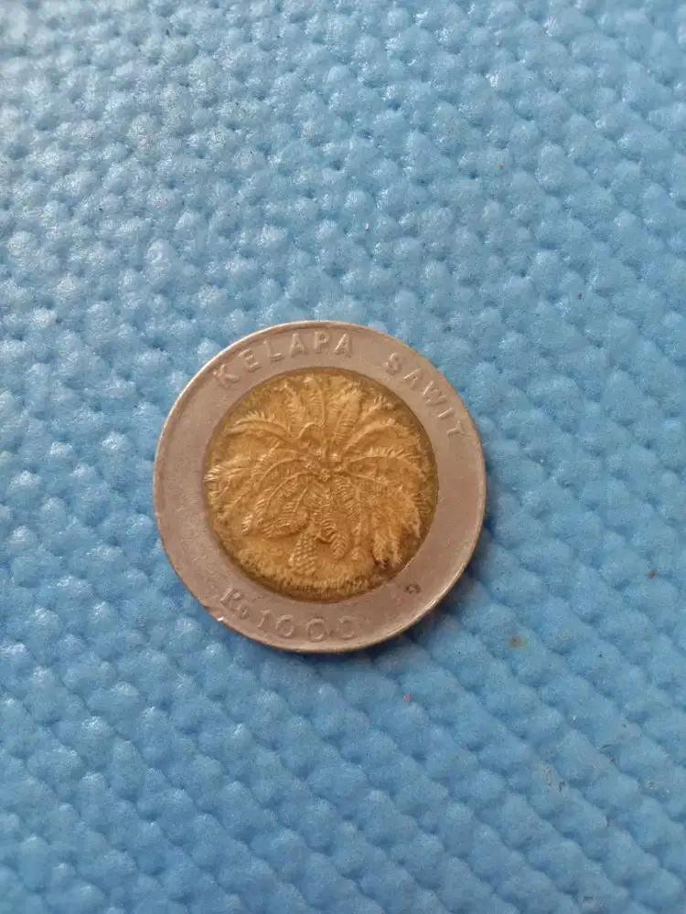Uang coin RP. 1000 KELAPA SAWIT 1996
