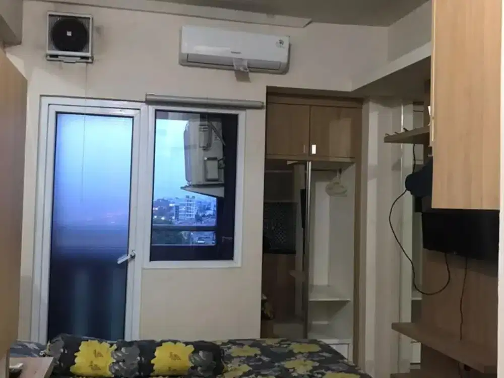 Apartemen studio the green pramuka city harian