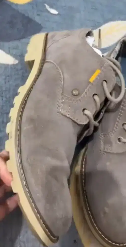 Sepatu brand CAT