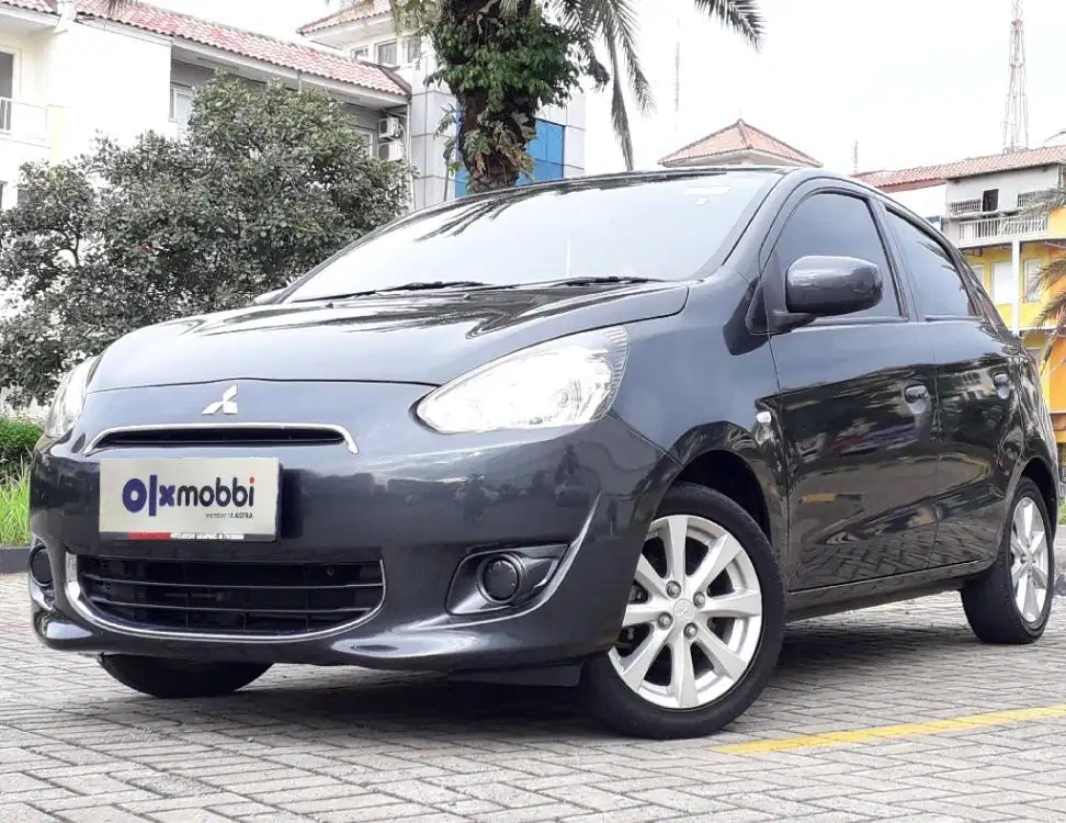 TDP 5, JT Mitsubishi Mirage 1.2 GLS Bensin-AT Hitam 2015