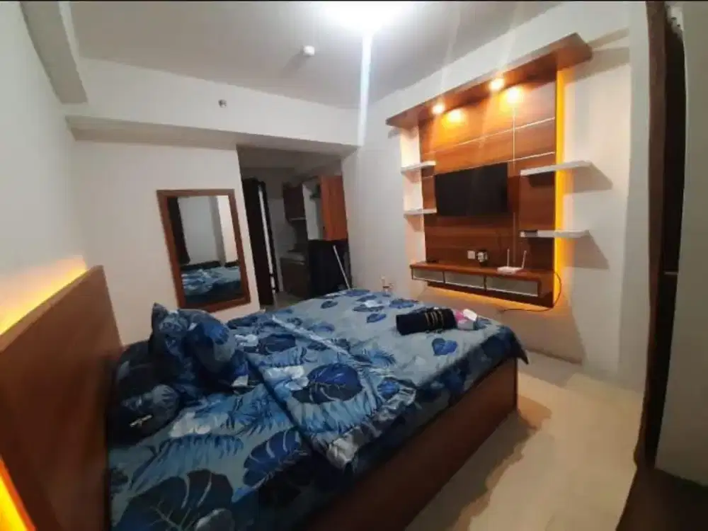 apartemen green pramuka city harian