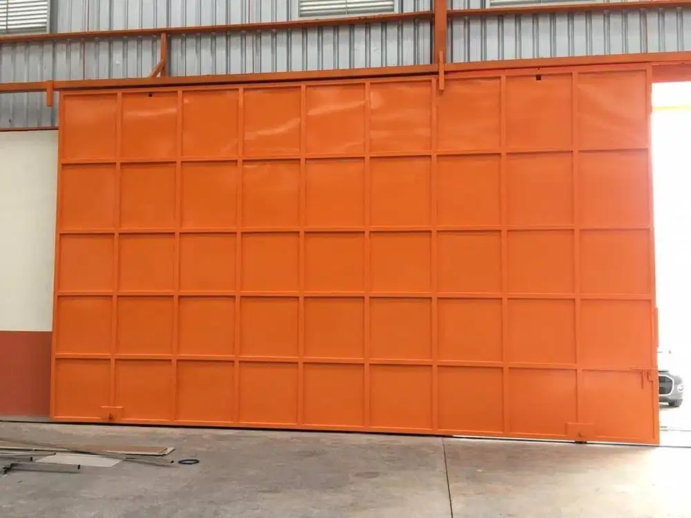 Pintu garasi handerson ruko