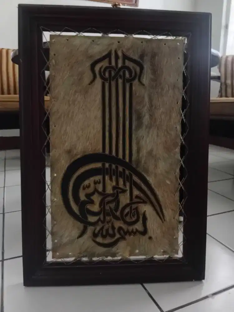 Kaligrafi kulit domba