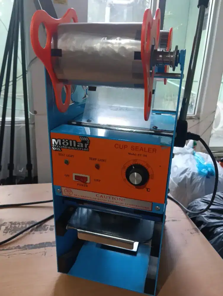Cup sealer bekas