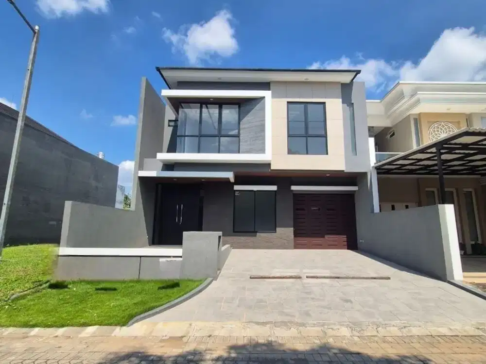 Rumah Citraland Woodland Surabaya Brand New House , hadap utara , row 2.5 mobil