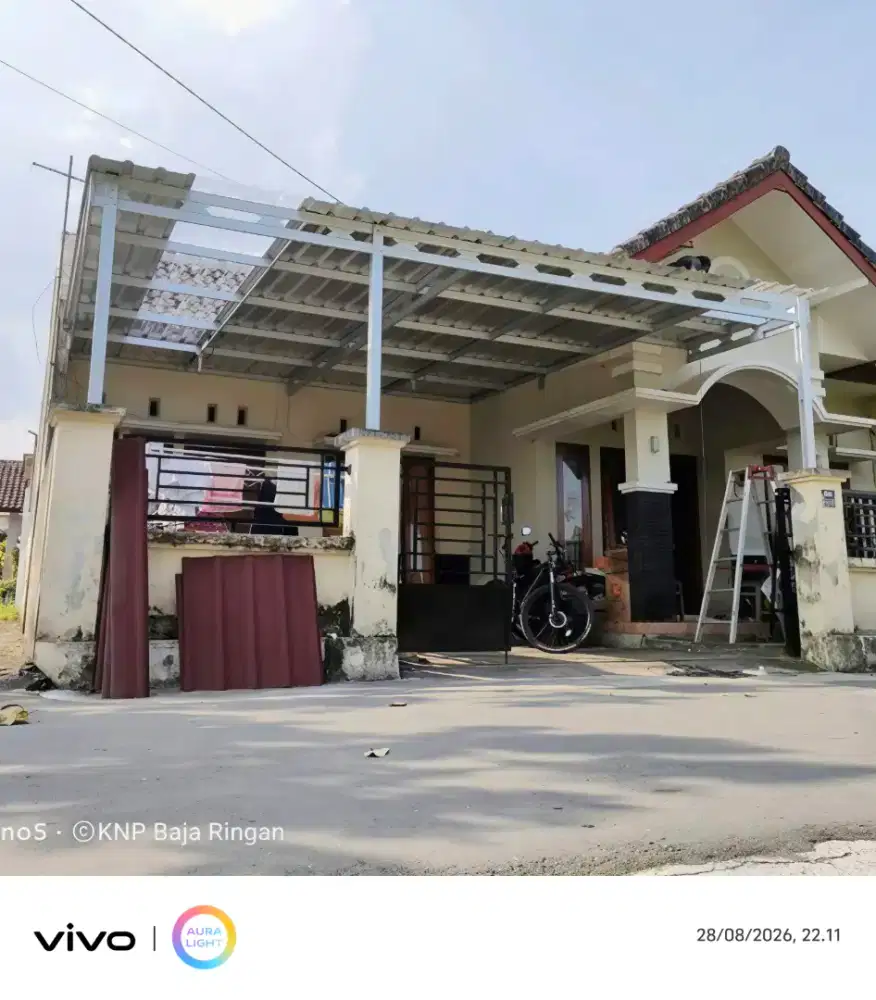Kanopi baja ringan dan garasi