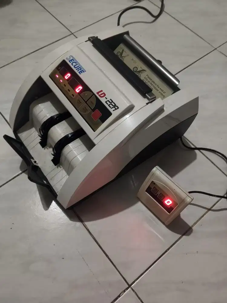 Secure mesin penghitung uang