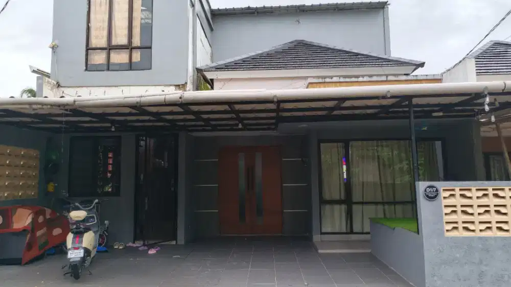 Over kredit rumah