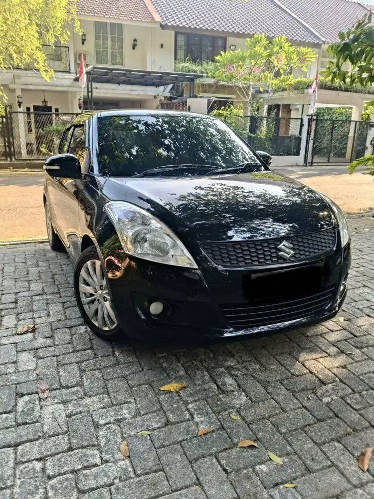 Suzuki Swift GX 1.4 Mnl 2013 Si Hitam Gress