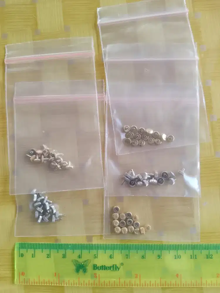 Crown knop puteran jam tangan