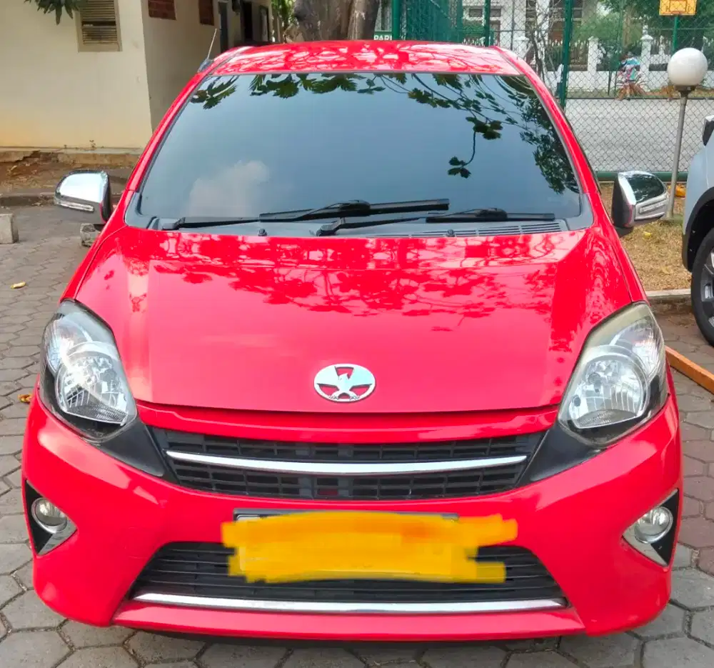 Agya matik, merah, 1000 CC, milik pribadi