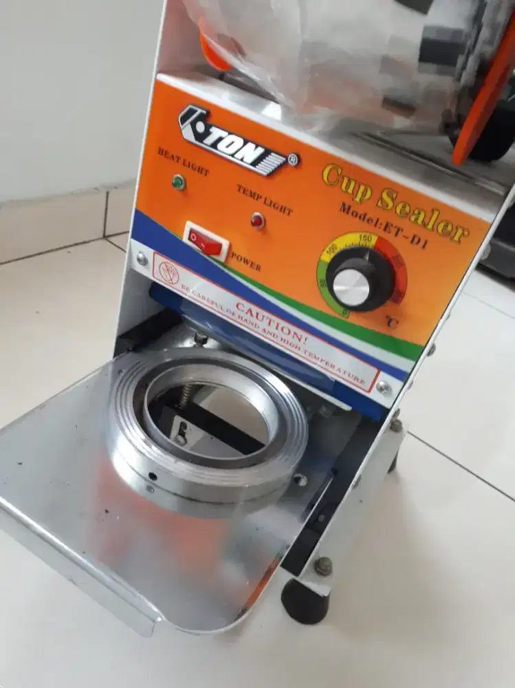 Cup Sealer panas dan Es