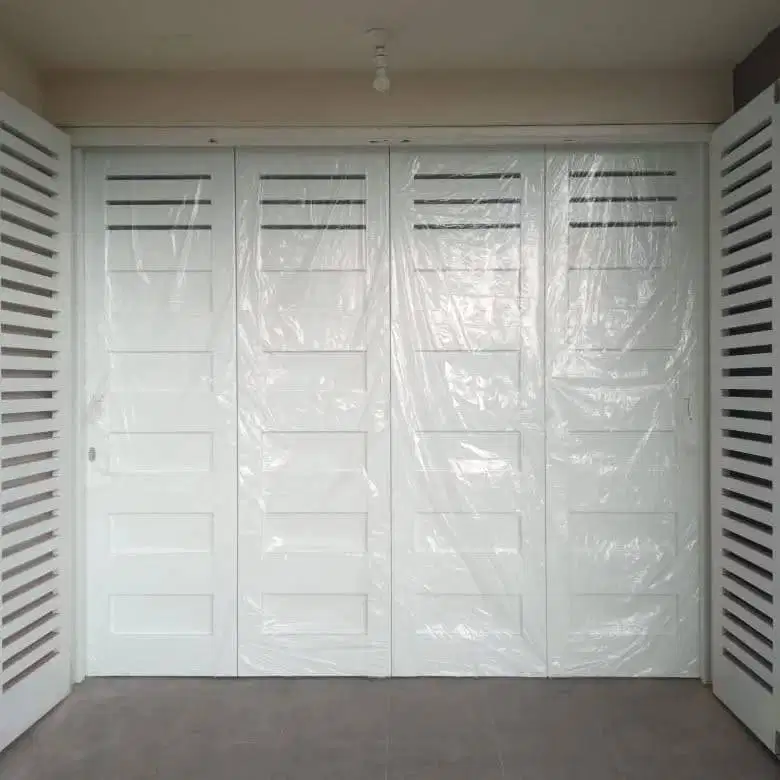 Pintu garasi besi model sliding lipat
