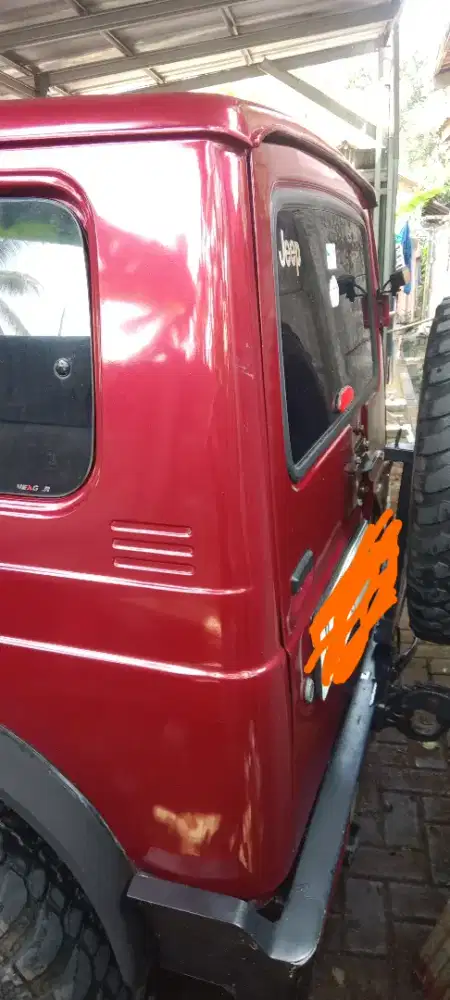 Mobil jimny thn 82