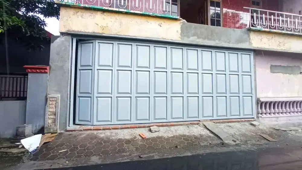 Pintu garasi besi sliding nikung/lipat