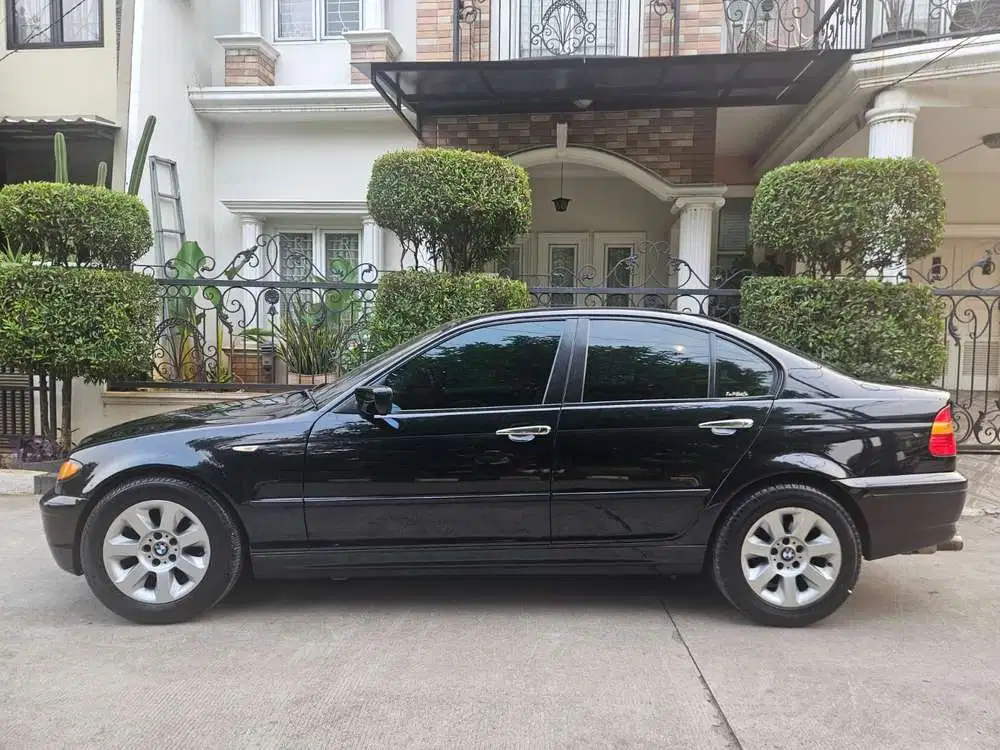 BMW 318i 2004 Bensin