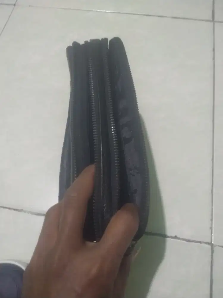 Hand bang atau tas tangan kulit