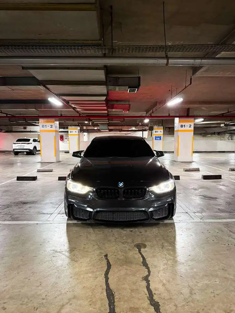 BMW 320i 2014 Bensin