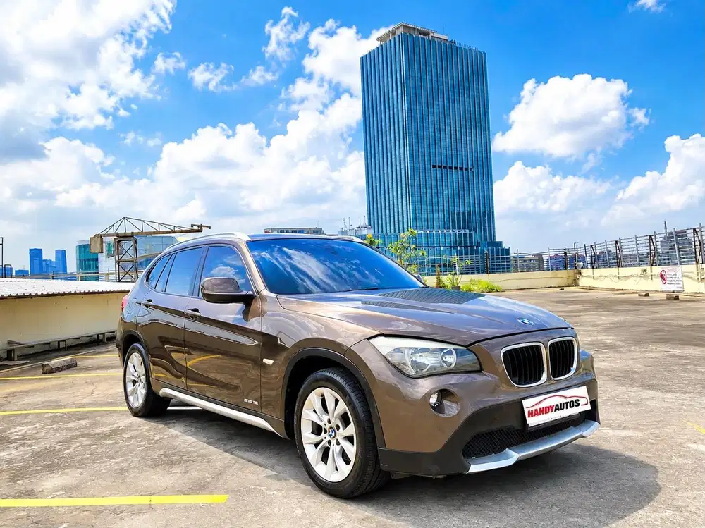 BMW X1 Executive 2011 Automatic Coklat Metalik
