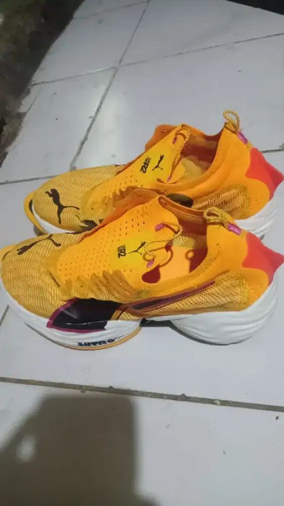 Sepatu lari merk puma ori