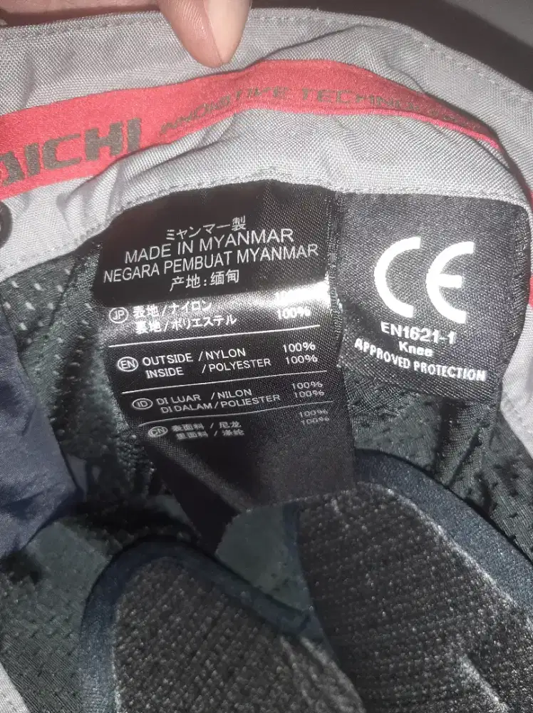 Baju aparel atau baju touring merk taichi.