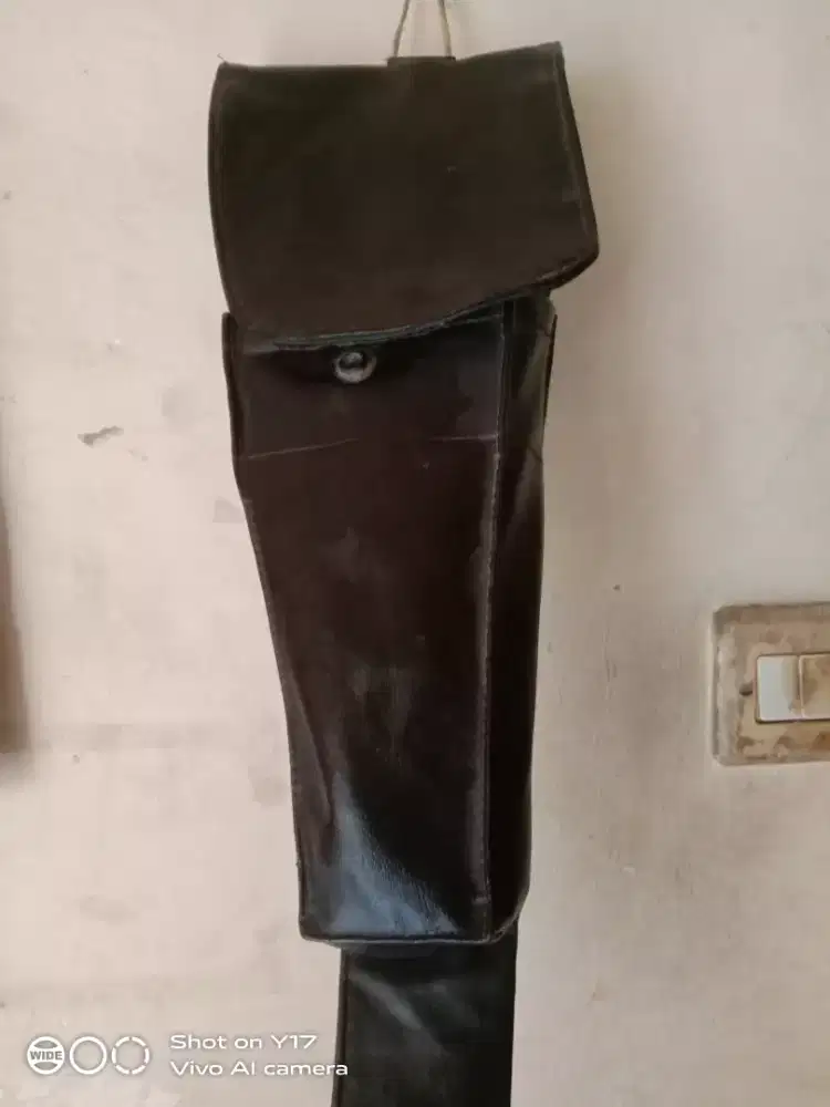 Sarung pedang pora bahan kulit