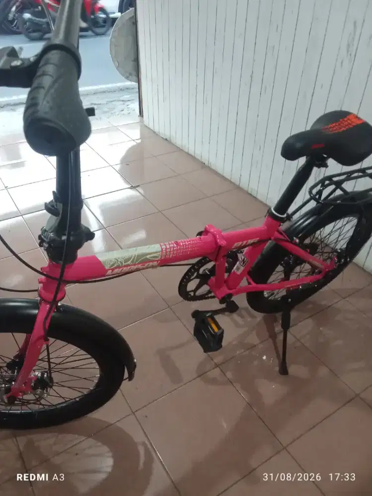Sepeda lipat 99 % baru
