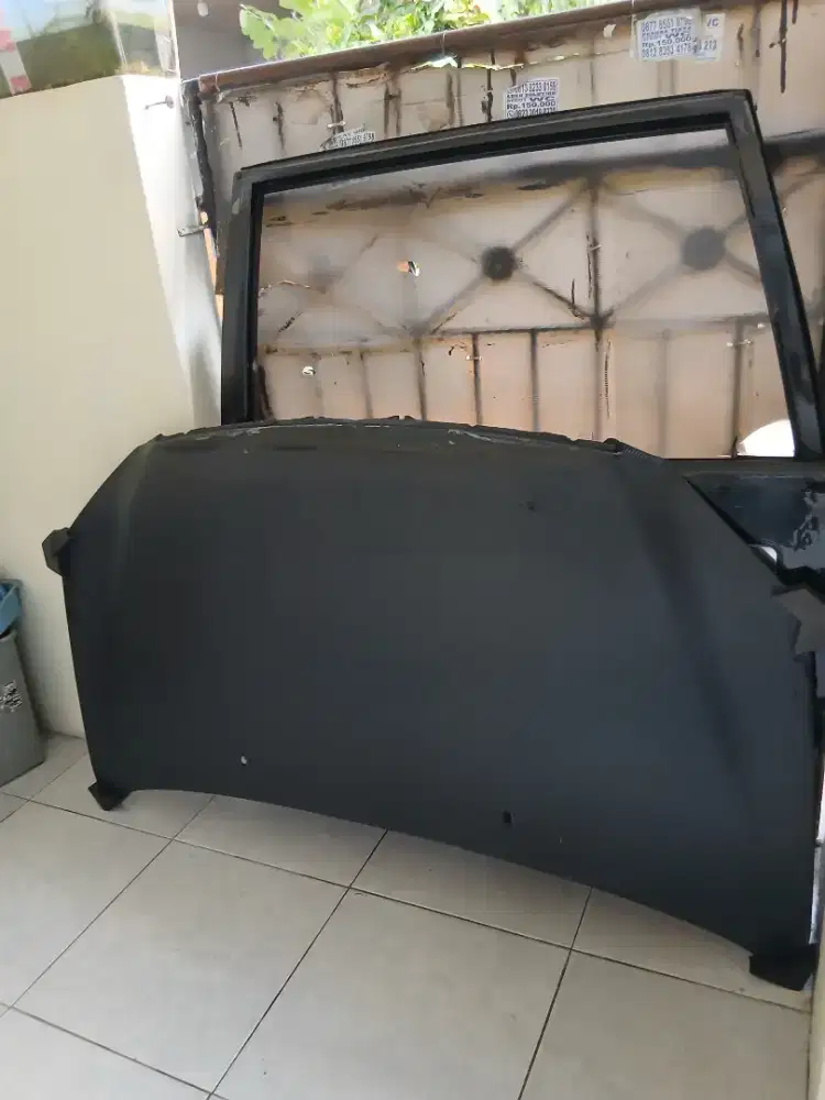 Pintu tengah kiri dan kap mesin xenia 2010