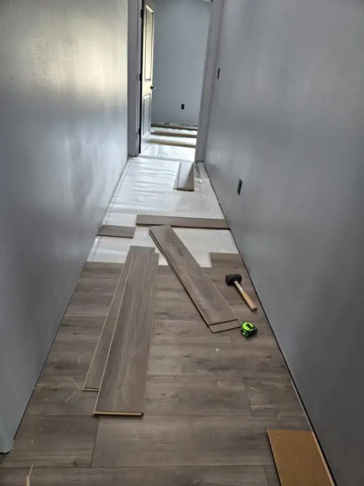Jasa pemasangan lantai SPC /1m²