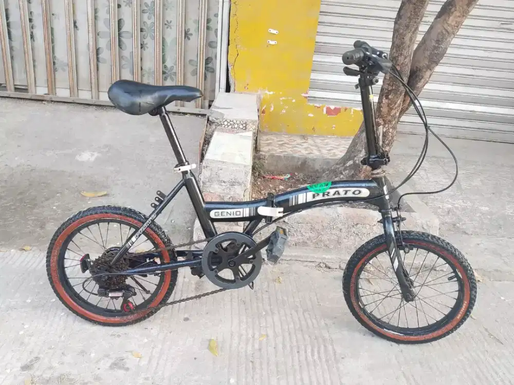 Sepeda lipat genio ring 16 inch.