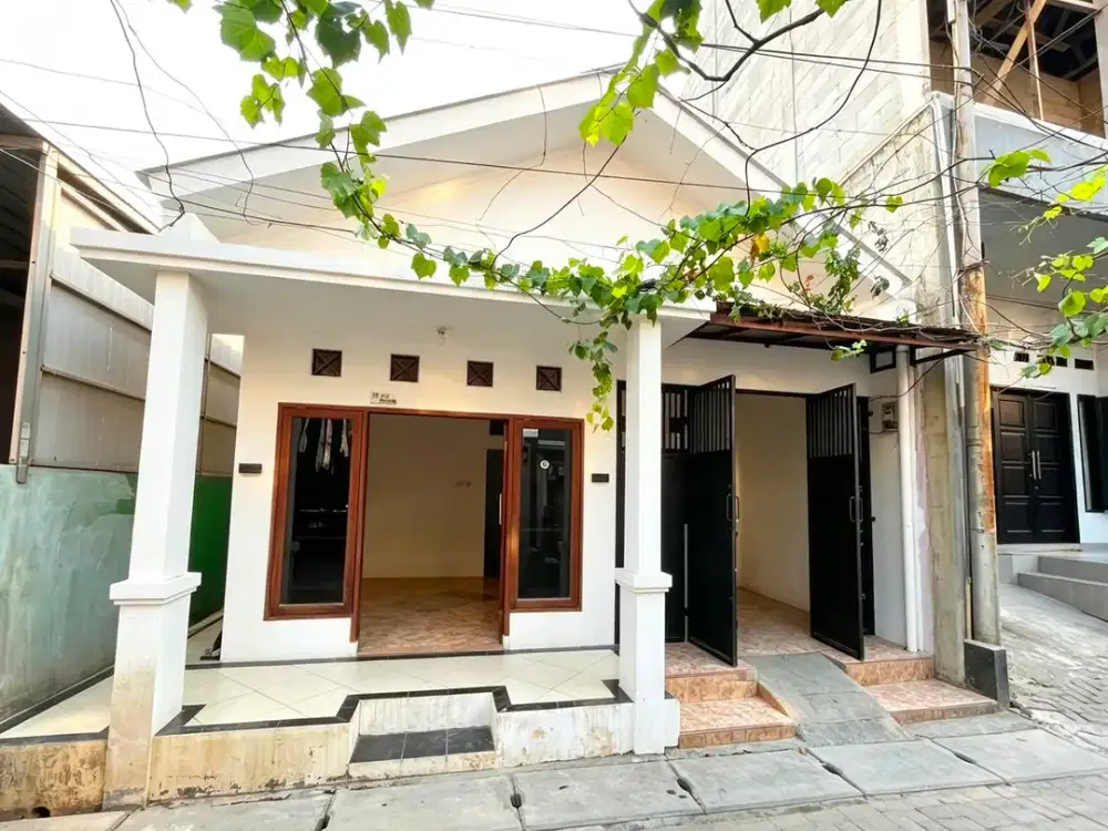 DIJUAL  Rumah cantik di jln inpres ciledug dengan desain modern tropis yang didominasi warna putih hingga membersih kesan bersih dan terang
