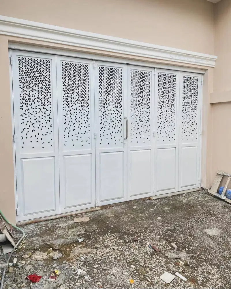Pintu garasi handerson laser cutting/minimalis
