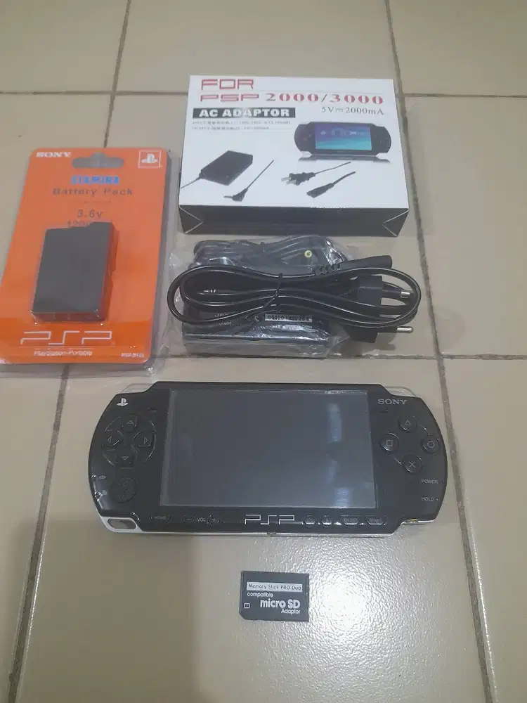 Psp slim seri 2000 Mulus No Mines Memory 8gb Full game Plus Cassan