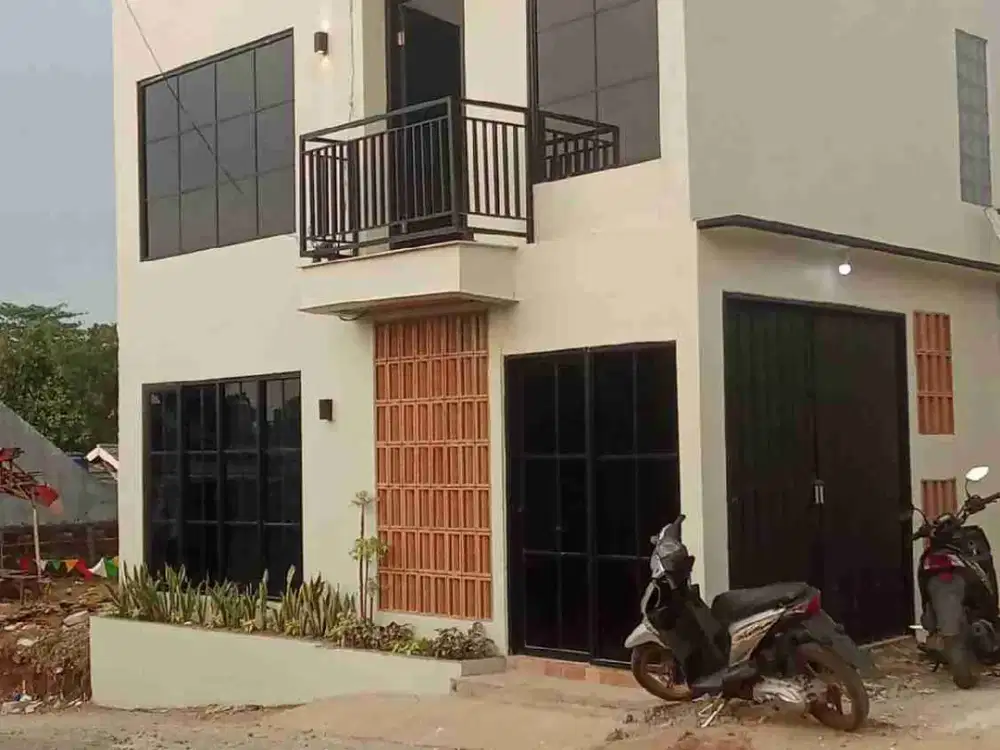 rumah 2 lantai + toko lokasi pinggir jalan