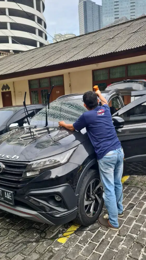 Lapak pemasangan kaca film mobil