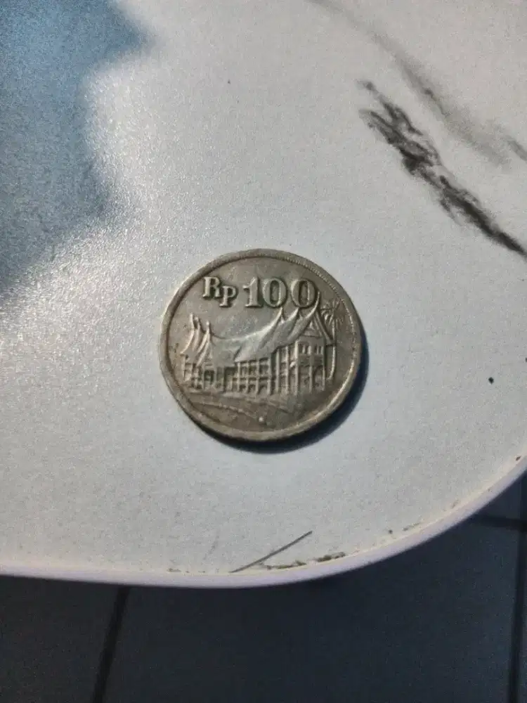 koin kuno 100 rumah gadang tebal tahun 1973