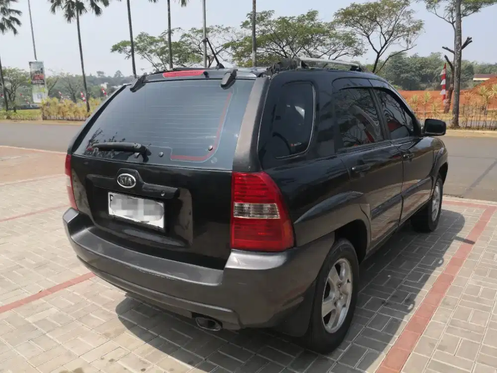KIA Sportage II 2005 saudara Tucson